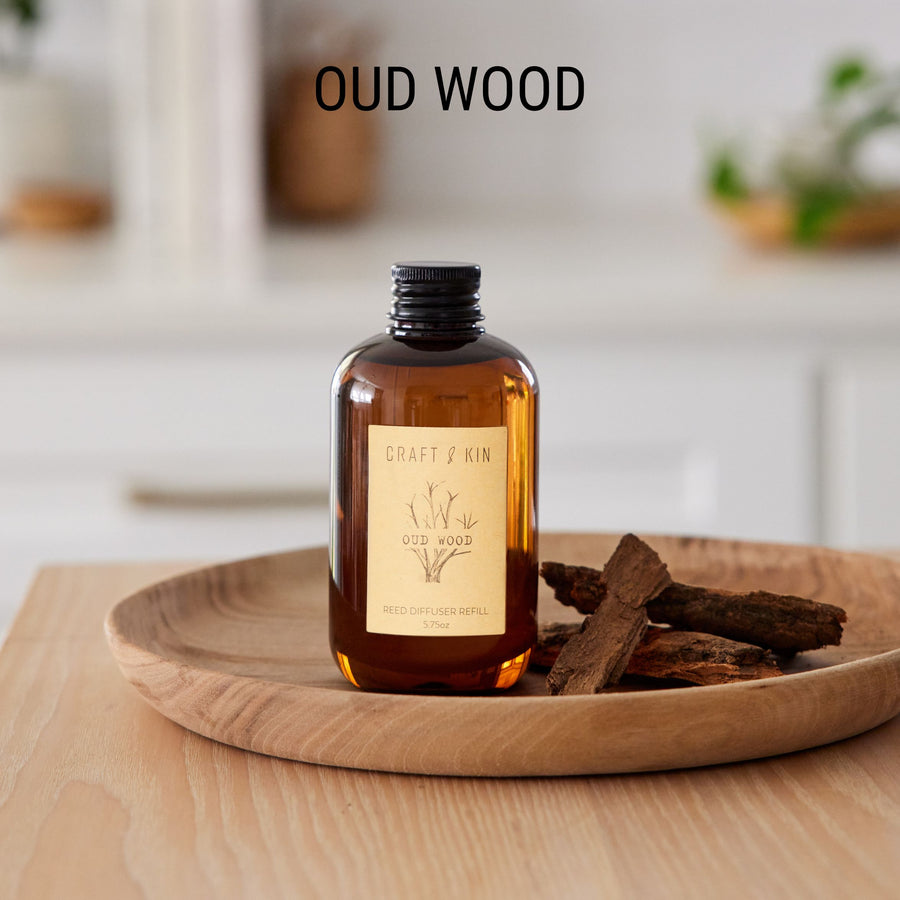 image of oud wood refill black cap